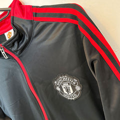 PANTS MANCHESTER UNITED NEGRO ROJO TALLA L