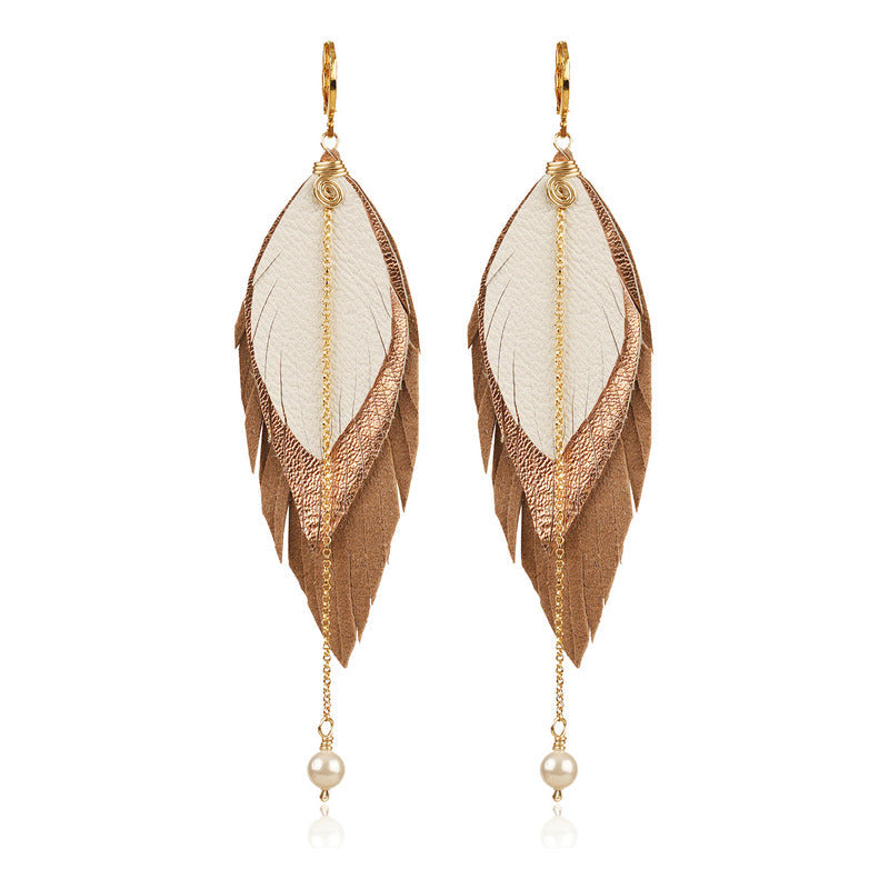 Aretes GAVILÁN mujer pluma cuero joyería elegante VANGANIA