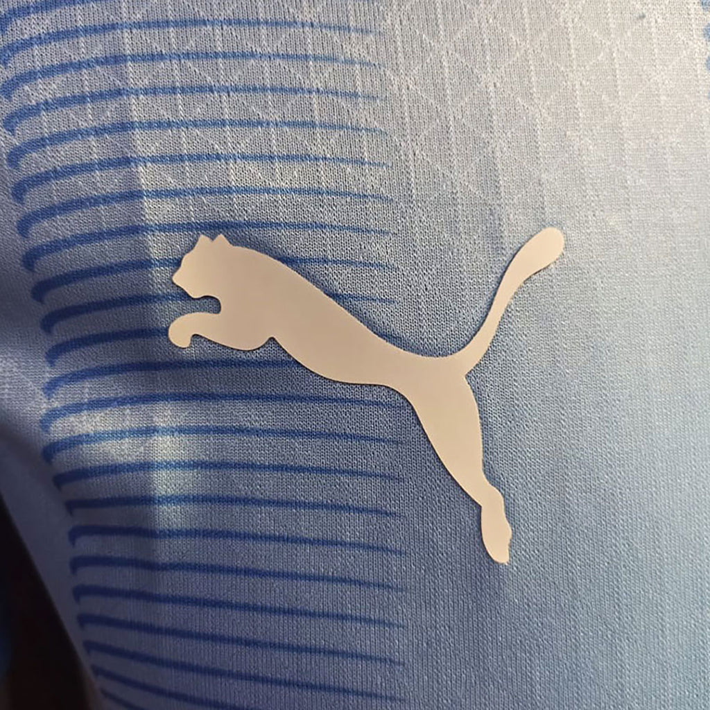 JERSEY PUMA MANCHESTER CITY LOCAL 23/24 MANGA CORTA AZUL CIELO TALLA S