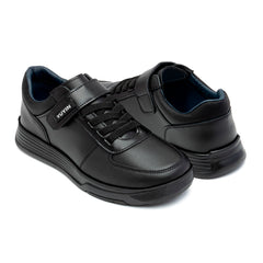 Zapato escolar negro niña Yuyin con hebilla floral y suela segura