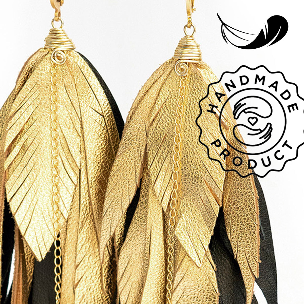 Aretes Maxi Raven Gold pluma largos dorados mujer VANGANIA-19CM