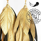 Aretes pluma con perla mayorca elegantes Vangania