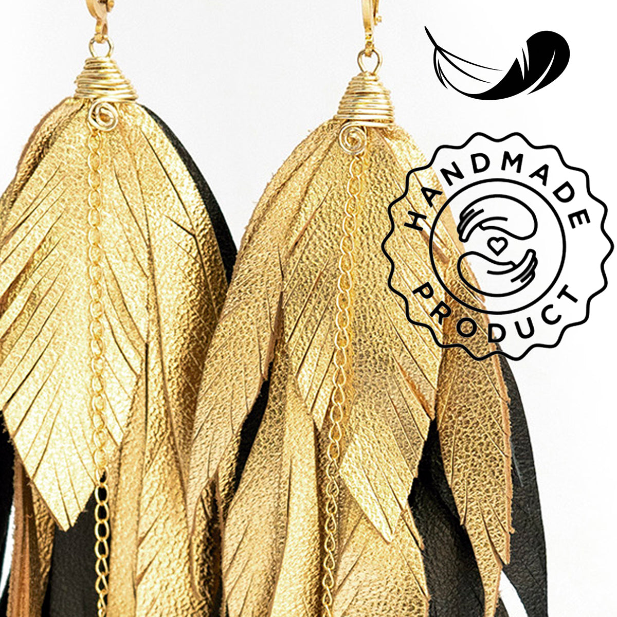 Aretes Maxi Raven Gold pluma largos dorados mujer VANGANIA-19CM