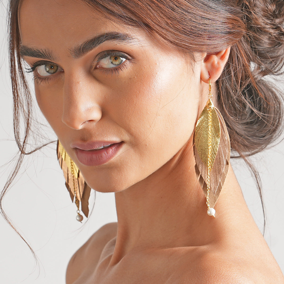 Aretes GAVILÁN mujer pluma cuero joyería elegante VANGANIA